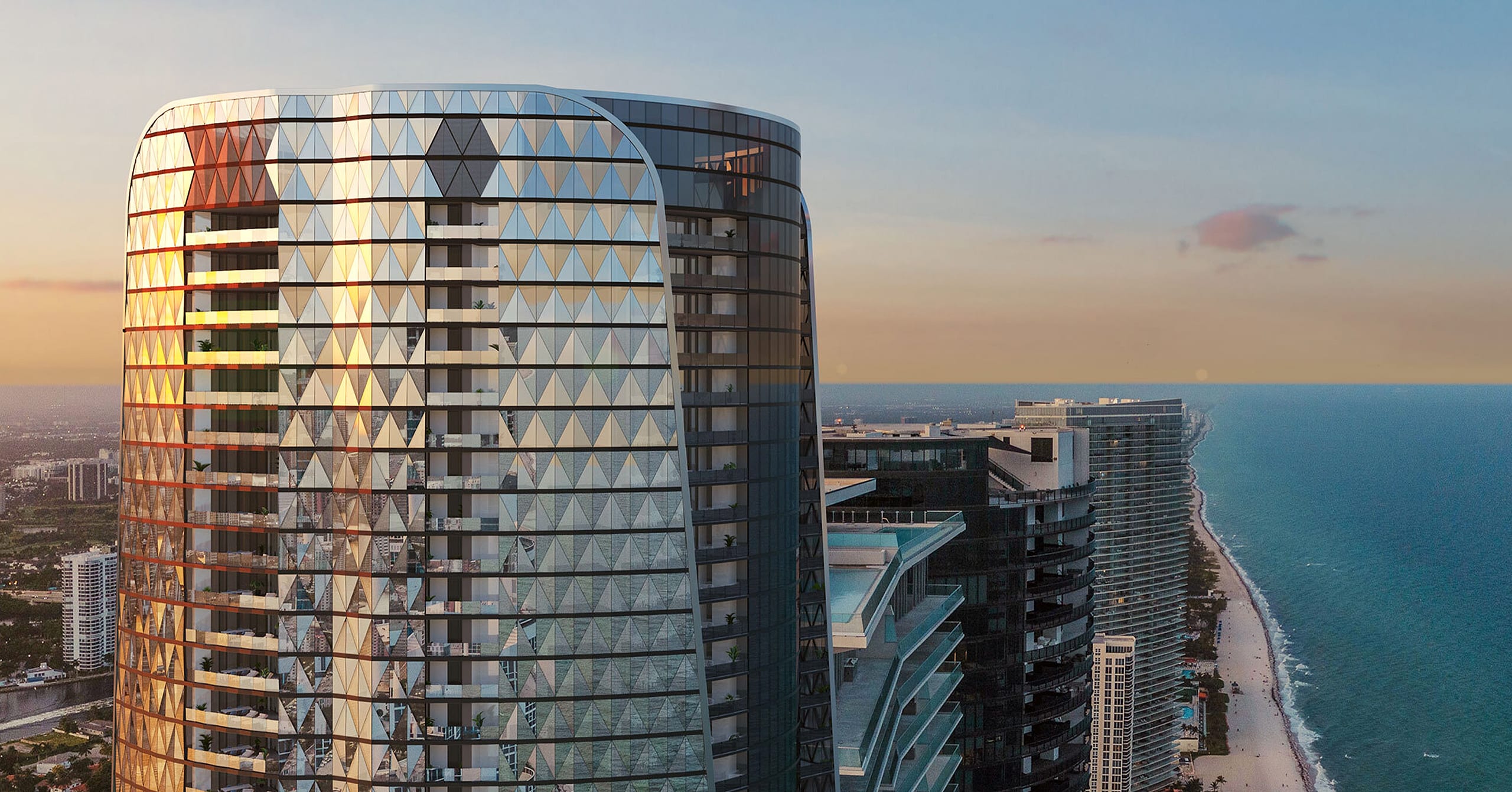 Sunset aerial of Bentley Residences over the Sunny Isles Beach coastline